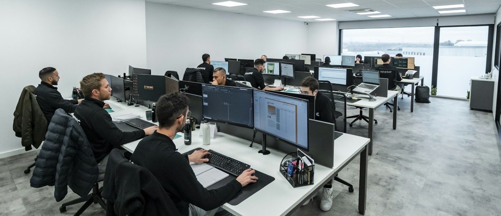A software development room with several workstations